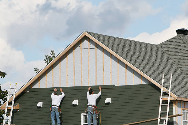 Professional Siding technician working in Moyock, NC